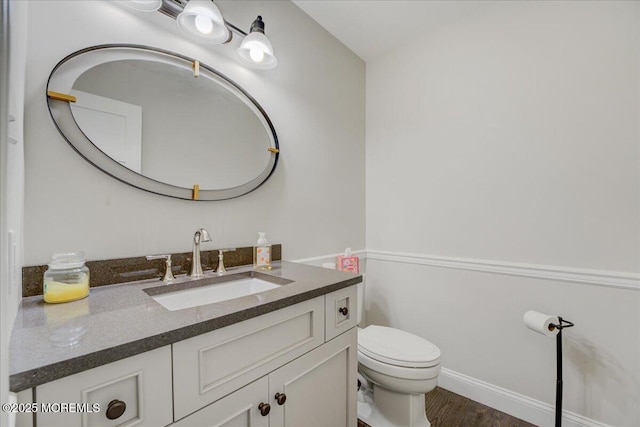 18 Vaughn Dr, Middletown, NJ 07748 - bathroom with vanity, toilet, and wood finished floors