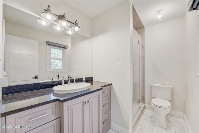 18 Vaughn Dr, Middletown, NJ 07748 - full bathroom featuring vanity, toilet, a stall shower, and baseboards