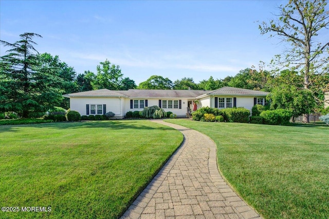 21 Northwoods Rd, Ocean Twp, NJ 07712 - single story home featuring a front lawn