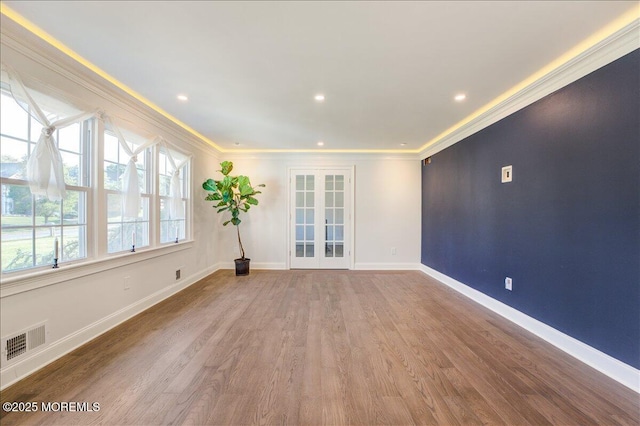21 Northwoods Rd, Ocean Twp, NJ 07712 - unfurnished room featuring ornamental molding, french doors, wood finished floors, baseboards, and recessed lighting