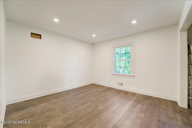21 Northwoods Rd, Ocean Twp, NJ 07712 - unfurnished room with wood finished floors, recessed lighting, and baseboards