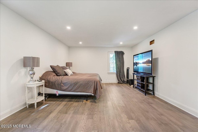21 Northwoods Rd, Ocean Twp, NJ 07712 - bedroom with wood finished floors, baseboards, and recessed lighting