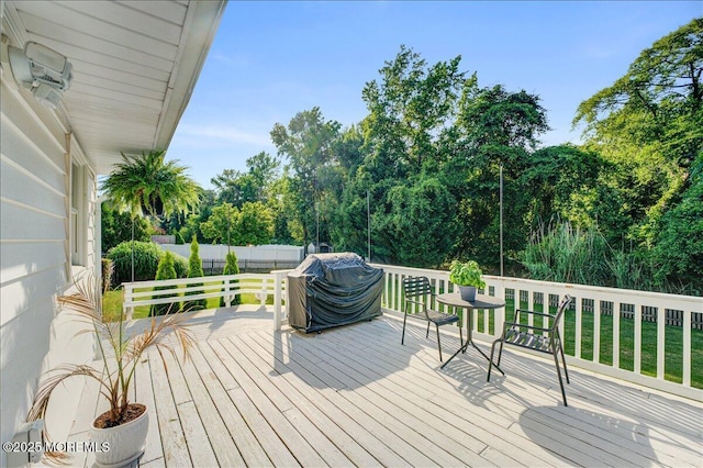 21 Northwoods Rd, Ocean Twp, NJ 07712 - wooden terrace with area for grilling and view of scattered trees