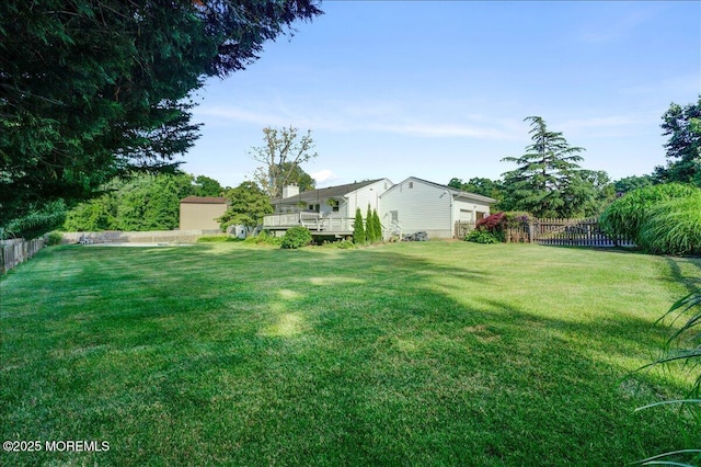 21 Northwoods Rd, Ocean Twp, NJ 07712 - view of yard with a wooden deck