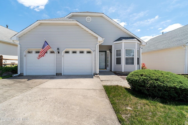 73 Summerhill Dr, Manahawkin, NJ 08050 - view of front of property featuring a garage and concrete driveway