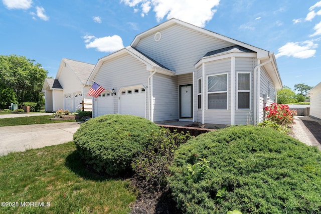 73 Summerhill Dr, Manahawkin, NJ 08050 - ranch-style home with an attached garage and concrete driveway