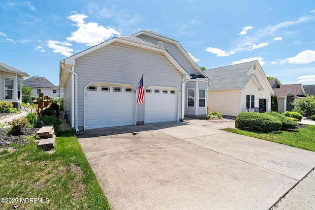 73 Summerhill Dr, Manahawkin, NJ 08050 - view of front of house with an attached garage and concrete driveway