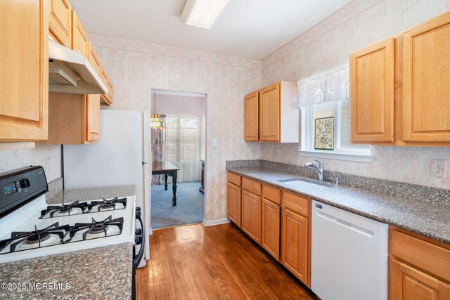 73 Summerhill Dr, Manahawkin, NJ 08050 - kitchen featuring white dishwasher, gas range oven, wallpapered walls, dark wood-type flooring, and under cabinet range hood