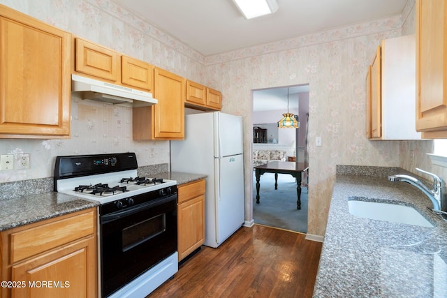 73 Summerhill Dr, Manahawkin, NJ 08050 - kitchen featuring gas range oven, under cabinet range hood, a sink, dark wood finished floors, and wallpapered walls