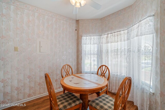 73 Summerhill Dr, Manahawkin, NJ 08050 - dining space featuring wood finished floors, healthy amount of natural light, ceiling fan, baseboards, and wallpapered walls