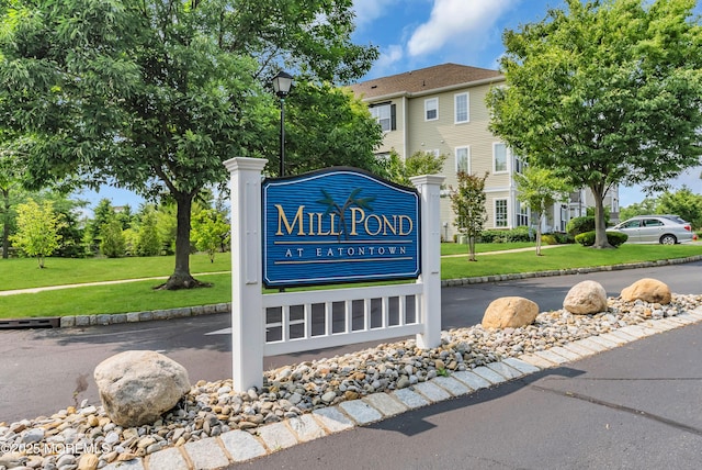 621 Mill Pond Way Unit 103, Eatontown, NJ 07724 - community sign featuring a yard