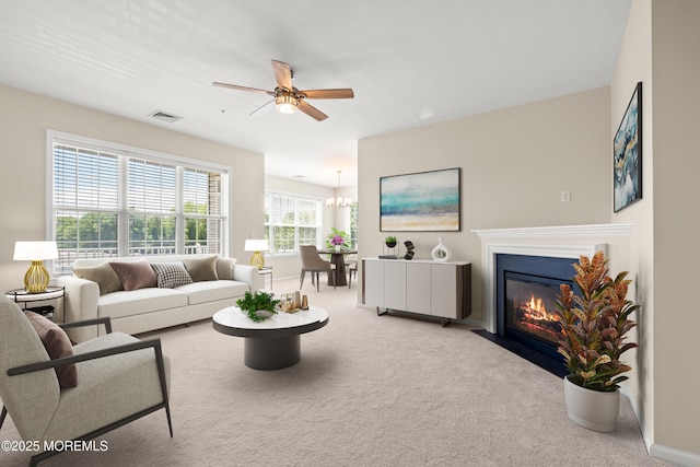 621 Mill Pond Way Unit 103, Eatontown, NJ 07724 - living area featuring ceiling fan, carpet flooring, a fireplace with flush hearth, and baseboards