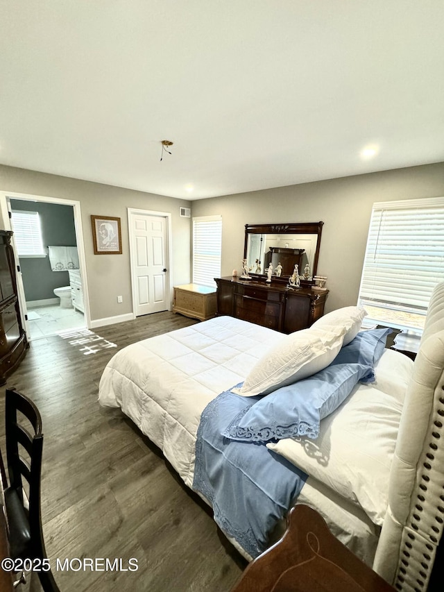 2560 Haverhill Ct, Toms River, NJ 08755 - bedroom with baseboards, wood finished floors, and ensuite bath