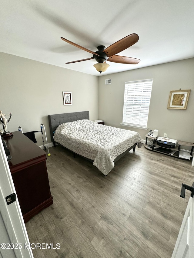 2560 Haverhill Ct, Toms River, NJ 08755 - bedroom with a ceiling fan and wood finished floors