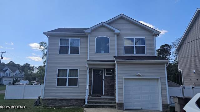 545 Hopedale Dr SW, Berkeley, NJ 08721 - traditional home featuring a garage and stone siding