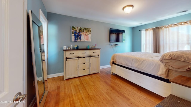 545 Hopedale Dr SW, Berkeley, NJ 08721 - bedroom with light wood-type flooring and baseboards
