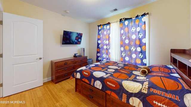 545 Hopedale Dr SW, Berkeley, NJ 08721 - bedroom with light wood-style flooring and baseboards