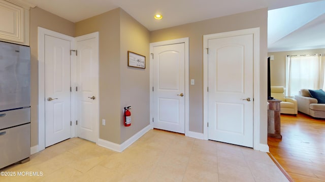 545 Hopedale Dr SW, Berkeley, NJ 08721 - corridor featuring baseboards, recessed lighting, and light tile patterned floors