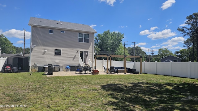545 Hopedale Dr SW, Berkeley, NJ 08721 - rear view of property with a patio area and an outdoor living space