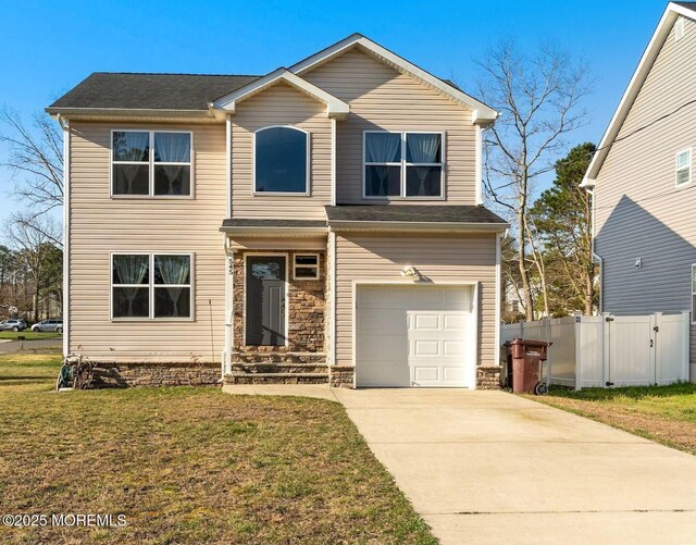 545 Hopedale Dr SW, Berkeley, NJ 08721 - traditional-style house featuring a garage and driveway