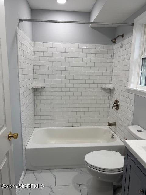 98 Beachway Ave Unit 9, Keansburg, NJ 07734 - bathroom featuring toilet, vanity, bathtub / shower combination, and marble finish floors