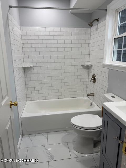 98 Beachway Ave Unit 9, Keansburg, NJ 07734 - full bath featuring toilet, vanity, tub / shower combination, and marble look tile flooring