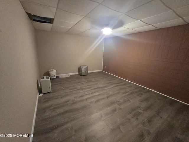 1305 Squirrel Rd, Wall, NJ 07719 - spare room with a drop ceiling, wood finished floors, and baseboards
