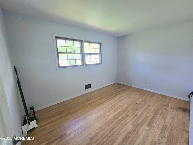 1305 Squirrel Rd, Wall, NJ 07719 - empty room with light wood-type flooring and baseboards