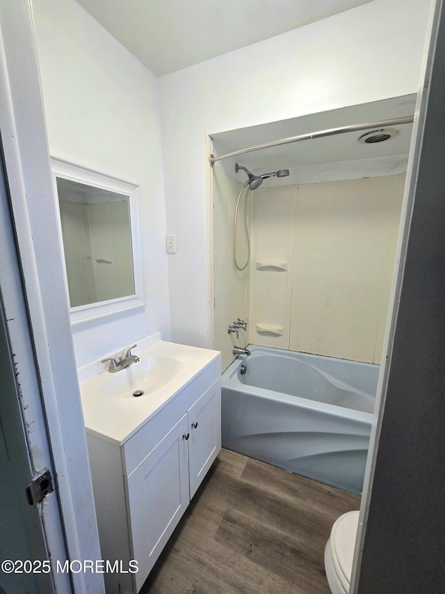 1305 Squirrel Rd, Wall, NJ 07719 - full bath with toilet, vanity, wood finished floors, and  shower combination