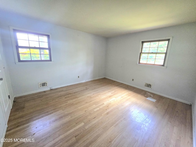 1305 Squirrel Rd, Wall, NJ 07719 - unfurnished room featuring light wood-style flooring and baseboards