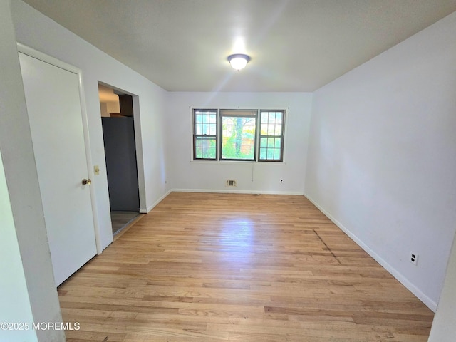 1305 Squirrel Rd, Wall, NJ 07719 - unfurnished bedroom with light wood-type flooring and baseboards