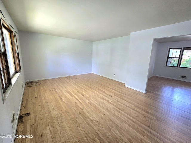 1305 Squirrel Rd, Wall, NJ 07719 - spare room featuring light wood-style floors and baseboards