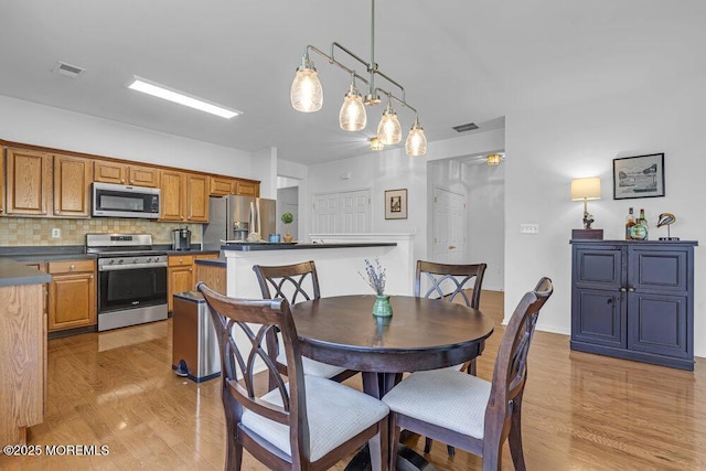 27 Cromwell Ln, Jackson, NJ 08527 - dining area with light wood finished floors