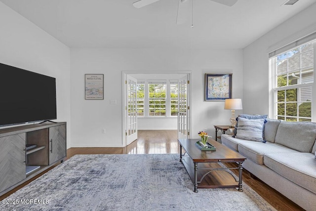 27 Cromwell Ln, Jackson, NJ 08527 - living room with wood finished floors, a ceiling fan, and baseboards