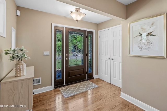 10 Woods Rd, West Long Branch, NJ 07764 - foyer featuring baseboards and light wood-style flooring