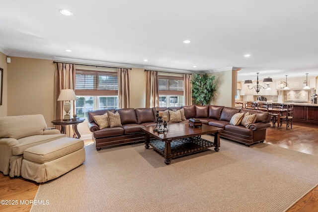 10 Woods Rd, West Long Branch, NJ 07764 - living room with ornamental molding, light wood finished floors, and recessed lighting