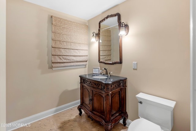10 Woods Rd, West Long Branch, NJ 07764 - half bath with toilet, vanity, and baseboards