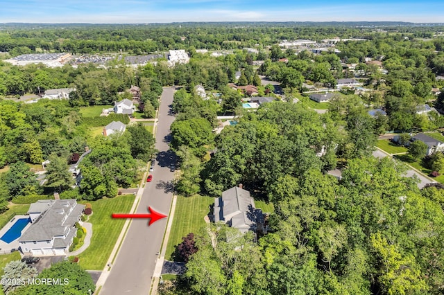 10 Woods Rd, West Long Branch, NJ 07764 - drone / aerial view of a forest and a pool area