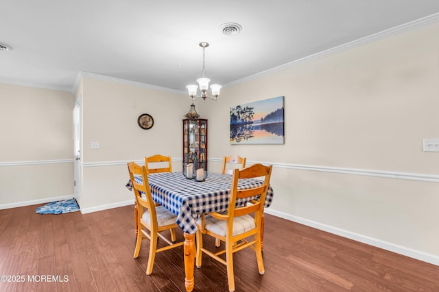 8 Brakenbury Ct, Toms River, NJ 08757 - dining space with a chandelier, wood finished floors, ornamental molding, and baseboards