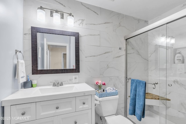 8 Brakenbury Ct, Toms River, NJ 08757 - full bath featuring vanity, toilet, a marble finish shower, and tile walls