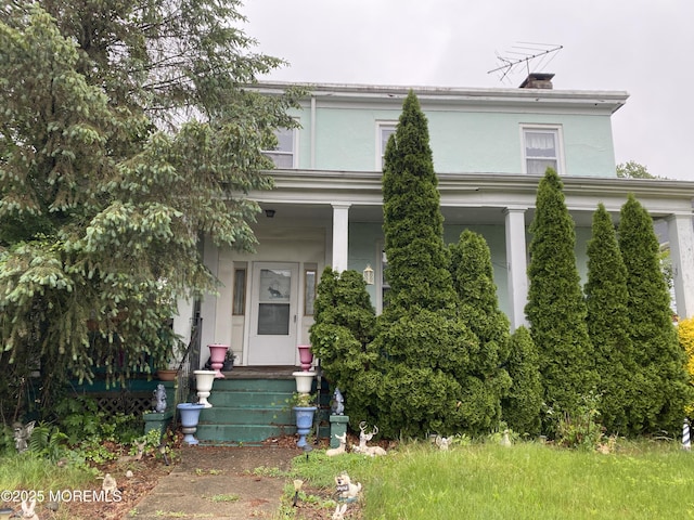 29 Broadway, Freehold, NJ 07728 - view of front of home with covered porch and stucco siding