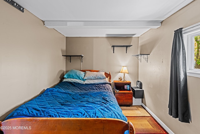 12 Central Ave, Waretown, NJ 08758 - bedroom with wood finished floors, beamed ceiling, and baseboards
