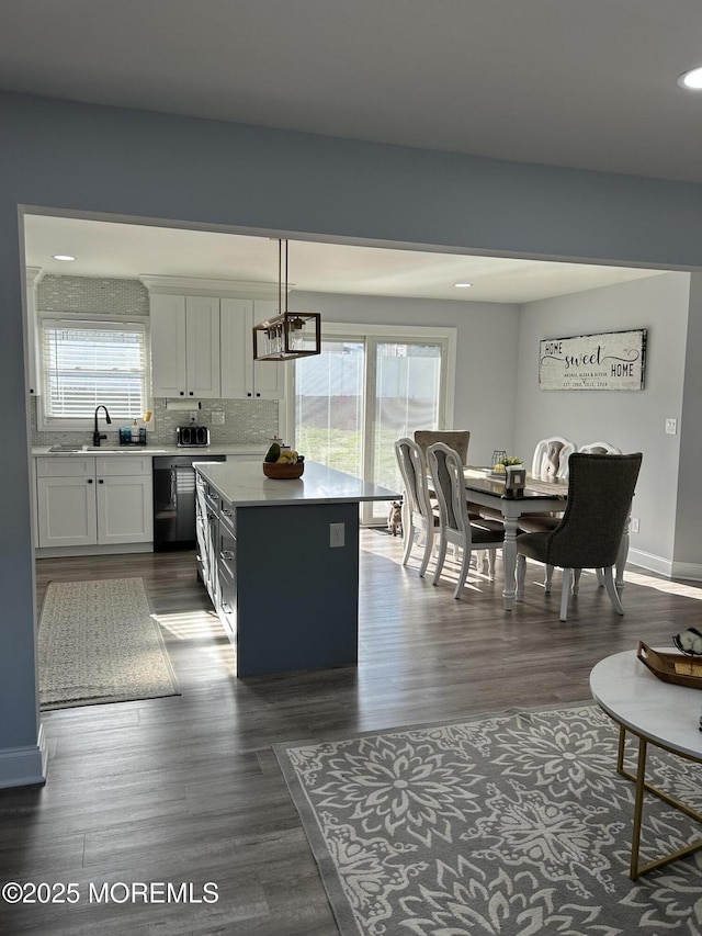 11 Jupiter Ct, South Amboy, NJ 08879 - kitchen with a sink, plenty of natural light, dishwasher, light countertops, and recessed lighting