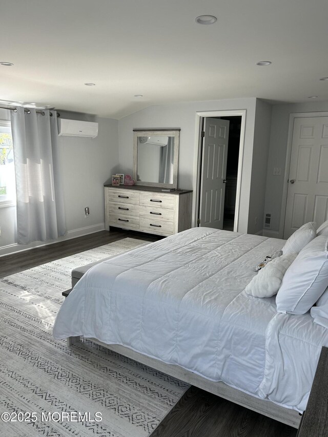 11 Jupiter Ct, South Amboy, NJ 08879 - bedroom featuring wood finished floors, baseboards, a wall mounted air conditioner, and recessed lighting