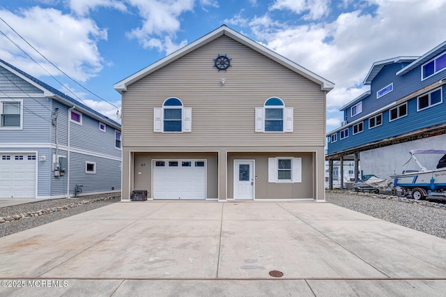 43 S Ensign Dr, Little Egg Harbor, NJ 08087 - view of front of home featuring a garage and driveway