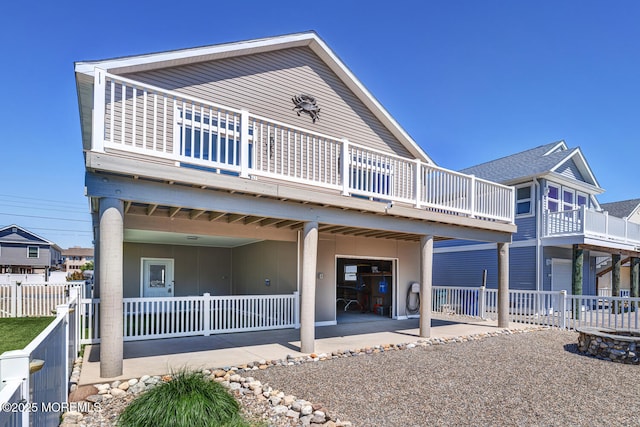 43 S Ensign Dr, Little Egg Harbor, NJ 08087 - view of front facade with a patio area and a wooden deck