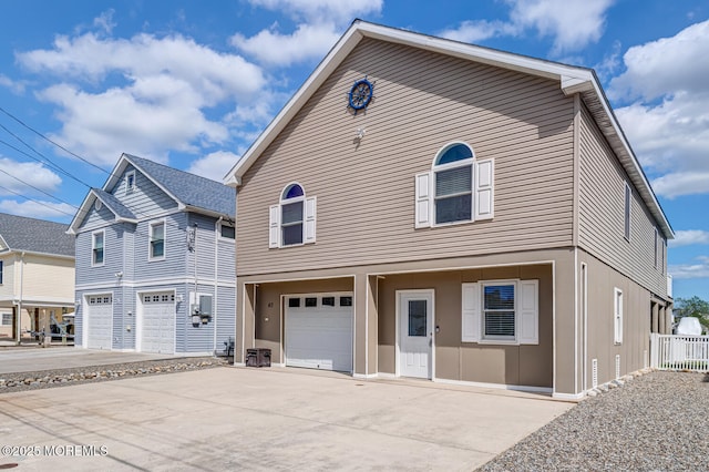 43 S Ensign Dr, Little Egg Harbor, NJ 08087 - view of front facade with a garage and concrete driveway