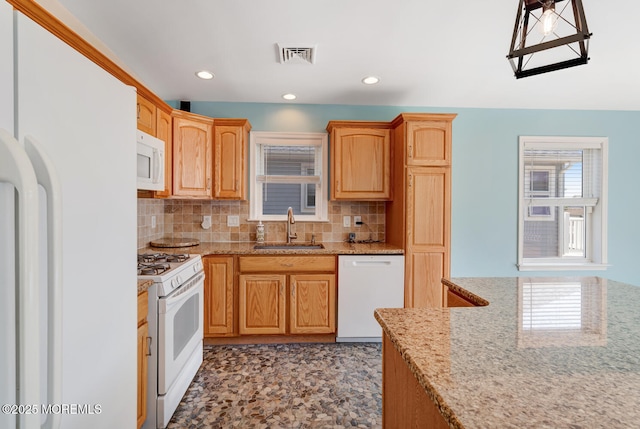 43 S Ensign Dr, Little Egg Harbor, NJ 08087 - kitchen with white appliances, a sink, light stone counters, tasteful backsplash, and recessed lighting