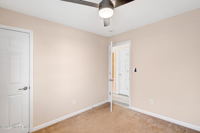 43 S Ensign Dr, Little Egg Harbor, NJ 08087 - unfurnished bedroom with light carpet, baseboards, and ceiling fan