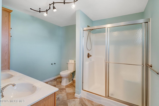 43 S Ensign Dr, Little Egg Harbor, NJ 08087 - full bathroom with a shower stall, toilet, double vanity, and baseboards